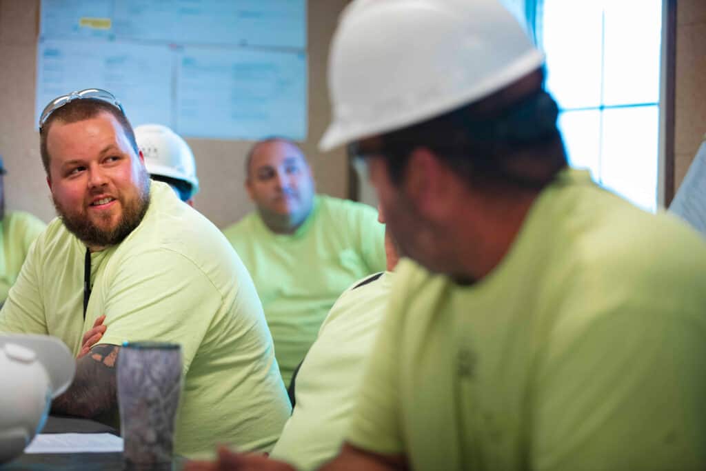 Employees in training session in a classroom.